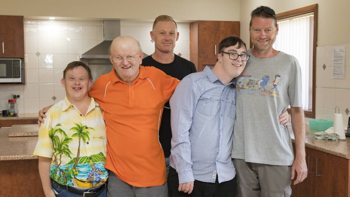 A happy household: The five M's - Mark, Marcel, Max, Mitchell and Michael - have transitioned from short term accommodation to a full time home through The Disability Trust's Supported Independent Living services.