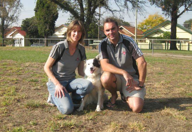 FURRY FRIEND: Lonely Pets Club directors’ Jo Gault and Justin Cofield with Tessa.