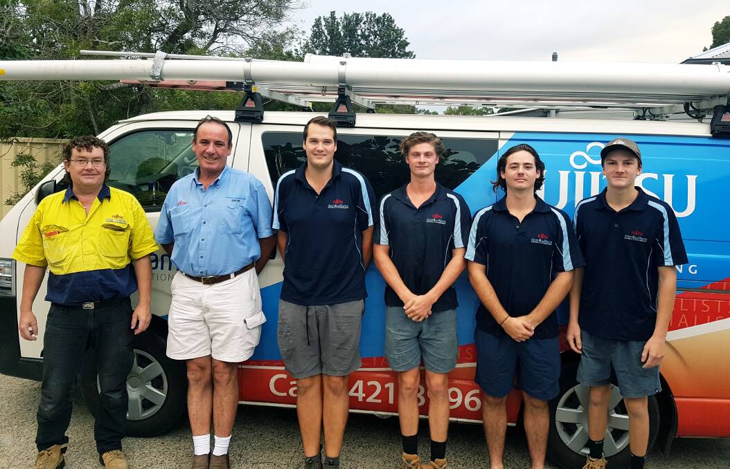 FRIENDLY FACES: The Dunn and Williams Electrical and Air Conditioning team is a familiar sight around the Shoalhaven. 