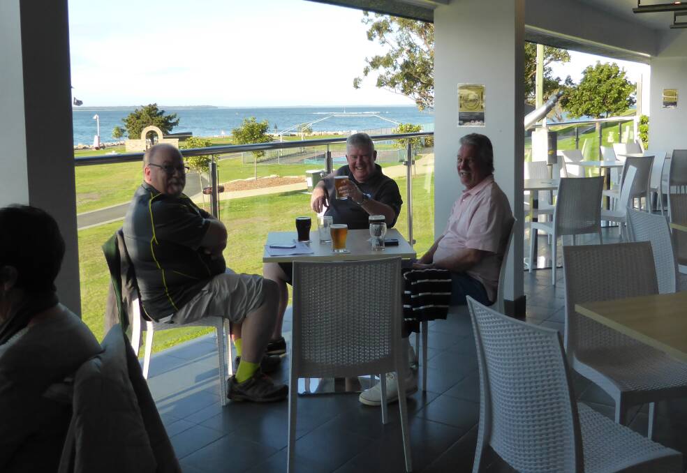 CHEERS: Club Jervis Bay customers enjoy a beverage by the stunning Huskisson water views from the alfresco dining terrace.