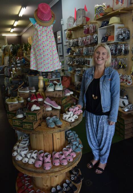 HEART AND SOLE: Beautiful Soles founder and owner Ali Henry with her range of baby and children's shoes and accessories. 
