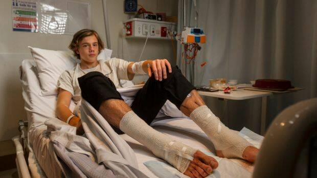 Sam Kanizay rests in hospital after being bitten while soaking his legs after a footy match. Photo: Scott McNaughton

