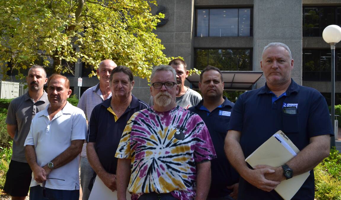 High and dry: TWU members and dumped Subloos employees gather at Shoalhaven City Council after losing their jobs on Tuesday.