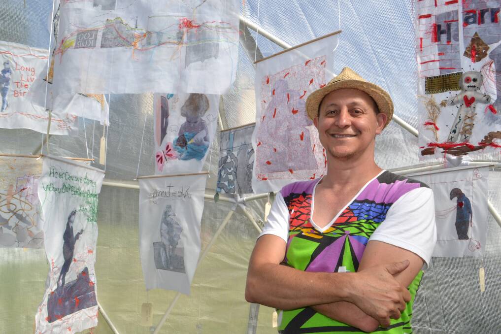 PROUD: Planet Nowra director Carlos Gomes amid an embroidery installation, works by Jill Talbot about ageing and loss. Picture: Rebecca Fist