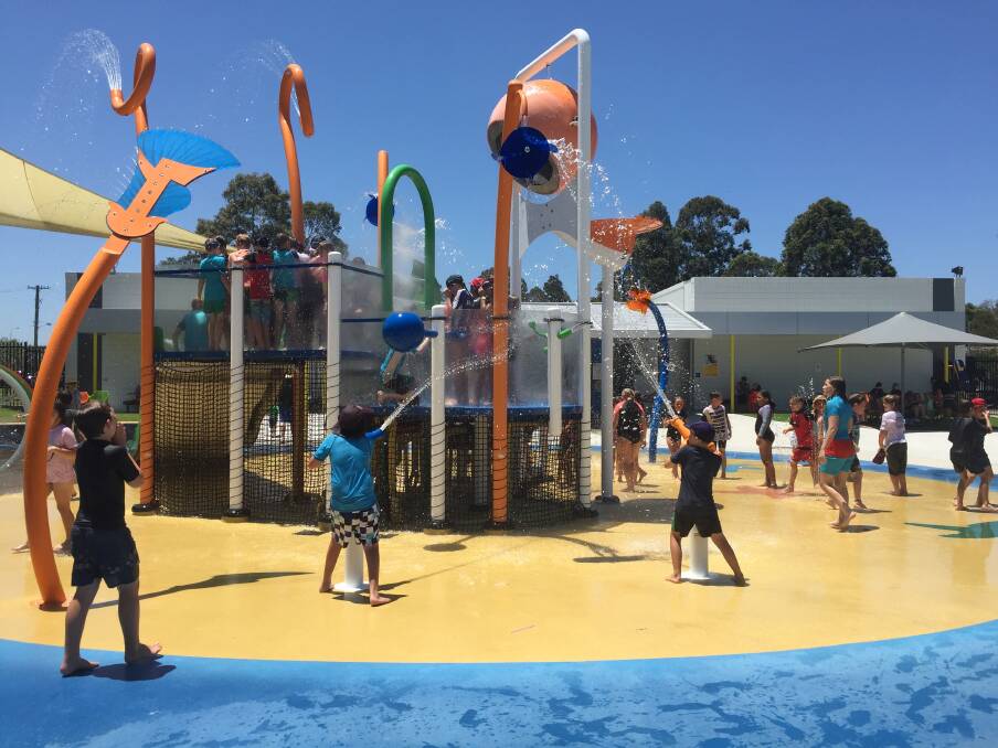 Kids play at the Nowra pool and aquatic park on a hot day in December. Picture: Rebecca Fist