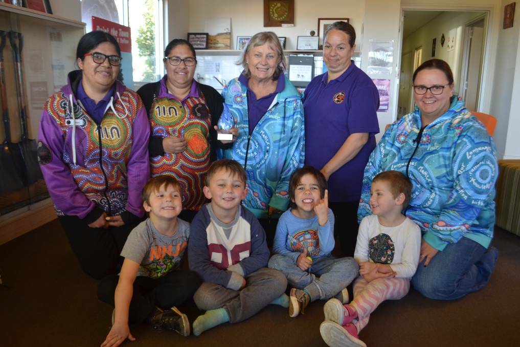 Local kids Cameron Hepburn, Rennox Wills, Marcus Miller and Tamika Moore and Cullunghutti childcare centre "aunties" when the centre won a regional NAIDOC award for its services in 2017. Picture: Rebecca Fist