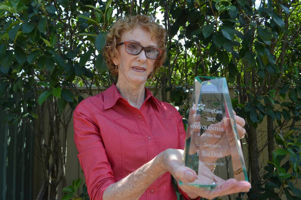 Living Care 2017 Volunteer of the Year Rae Doak accepts her award on Tuesday.