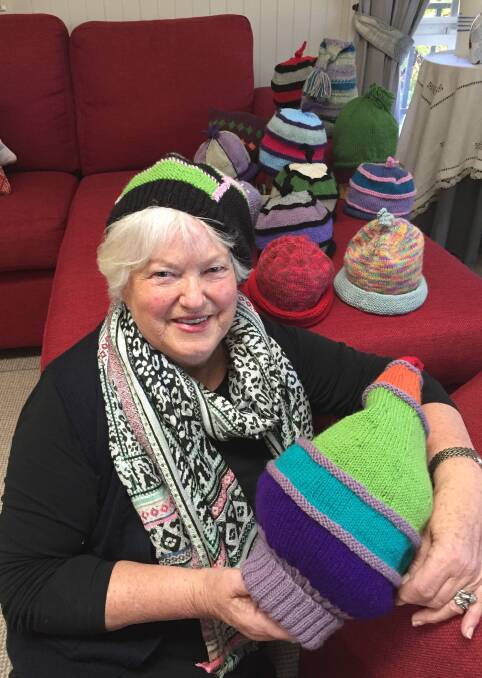 HAND-KNITTED: 'Three Ps' organiser Barbara Grant hopes her beanies of many shapes and sizes sell out at the event in Nowra on Tuesday. Picture: Rebecca Fist