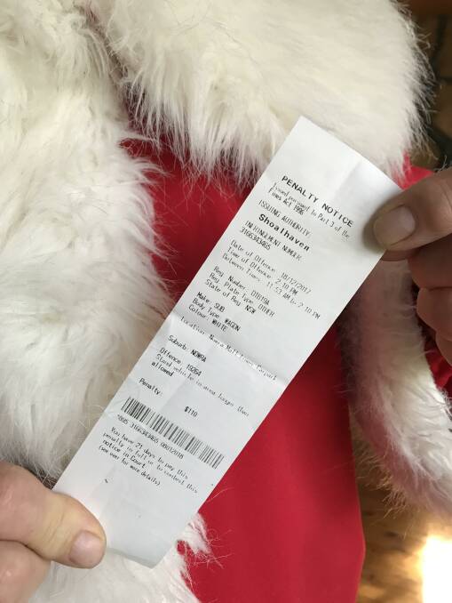 NOT FINE: Parking rangers not in the Christmas spirit last December when Santa copped a fine in Nowra's CBD.