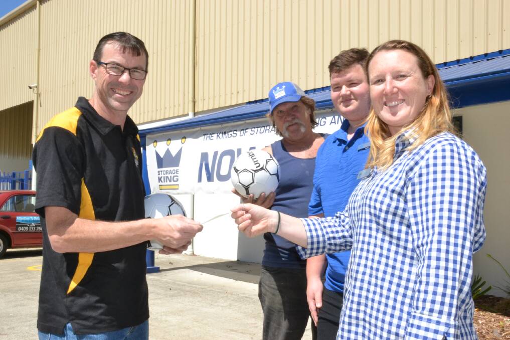 SUPPORT: Bomaderry Football Club vice-president Clayton Muller accepts the donation from Storage King South Nowra owner Brett Beverley, assistant manager Jeffrey Lamont and manager Robyn Jaques. Picture: Robert Crawford