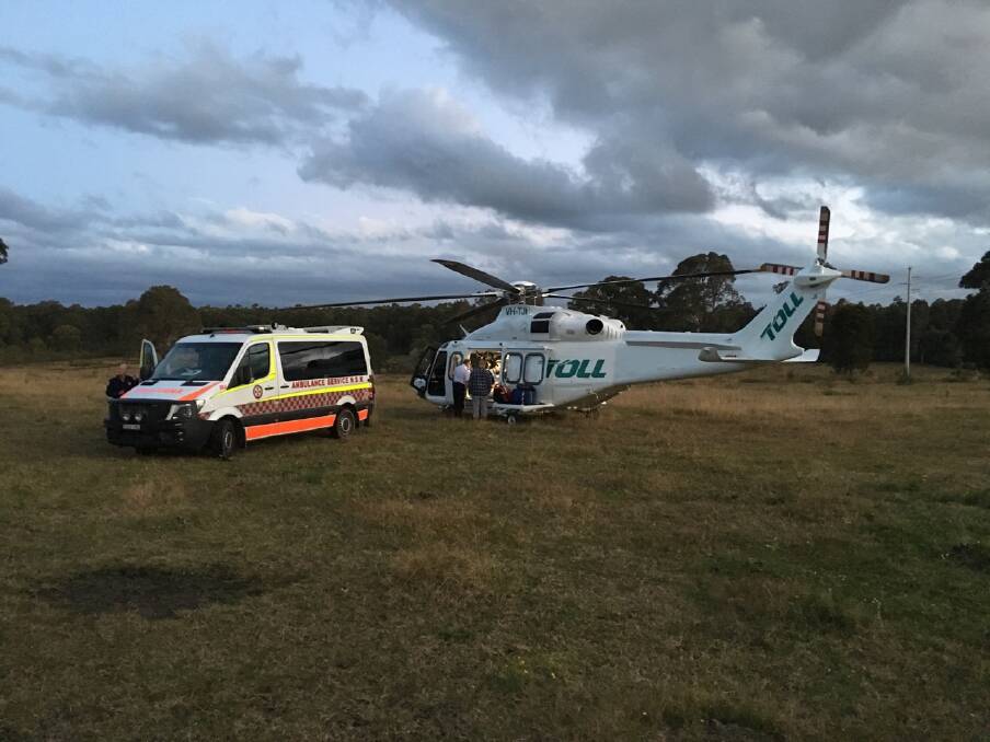Paramedics and helicopter on scene at North Nowra, set to airlift a patient with suspected spinal injuries from falling off a horse. Picture: Contributed