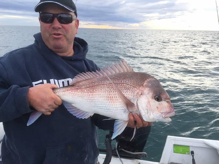 Local fishing guru Jonno with a solid Shoalhaven snapper