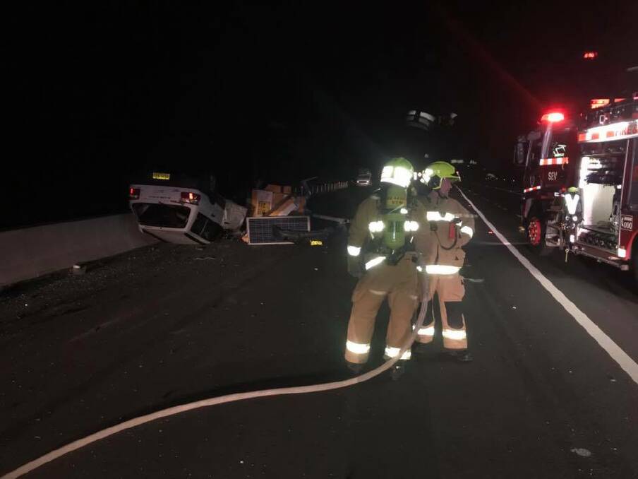 Princes Highway, Berry, where a car rolled and flipped in the early hours of the morning. Picture: Berry Fire and Rescue