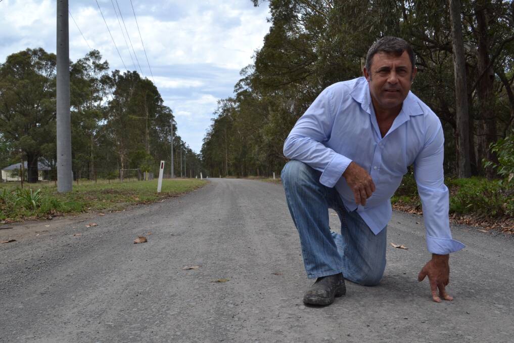 Rod Foyel on The Links Road, South Nowra, a road he would like sealed, due to business inconveniences and safety concerns. Picture: Rebecca Fist