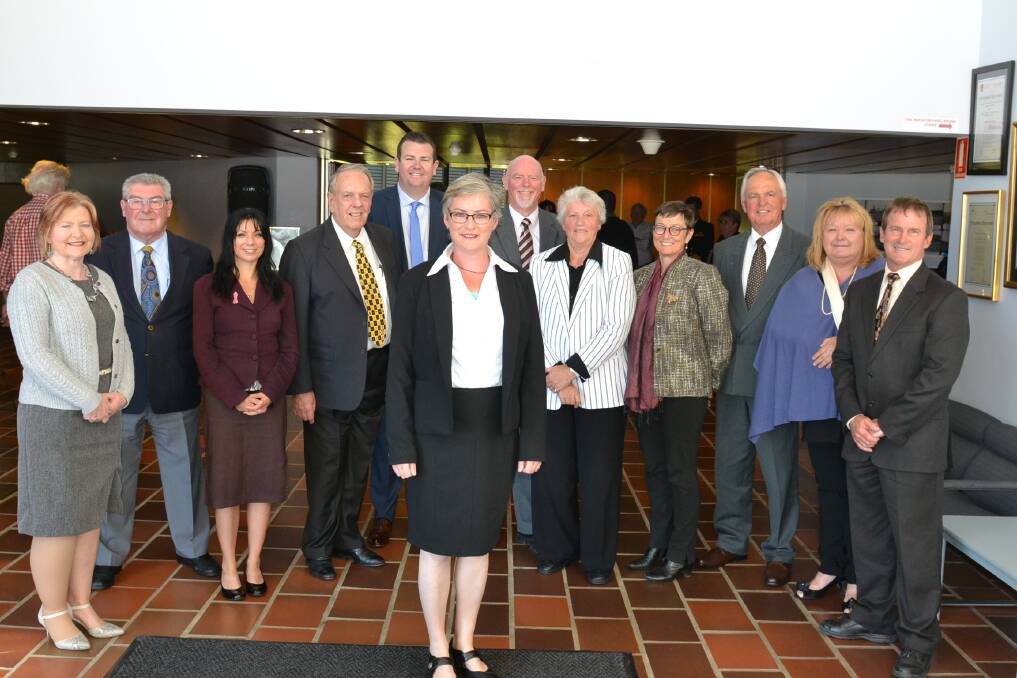 Shoalhaven City Councillors surround mayor Amanda Findley on their inauguration last year