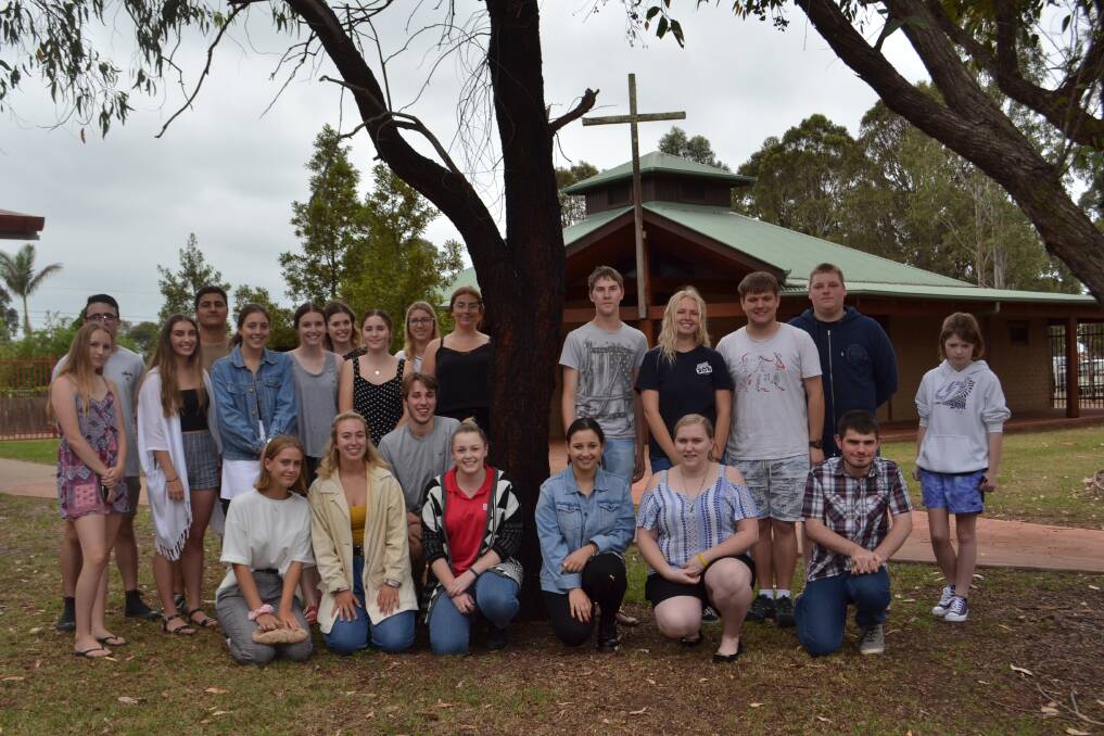 St John's year 12 graduates celebrate their results at a luncheon on Friday.