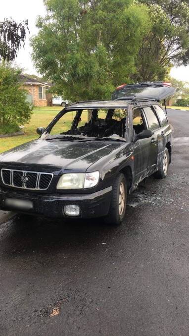 The black Subaru was extensively damaged in the fire in Romar Close, Bomaderry in the early hours of Sunday.