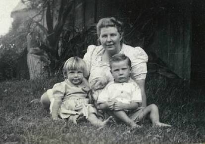 Joan Smith with her young children Pat and Bob on Pig Island in 1947.