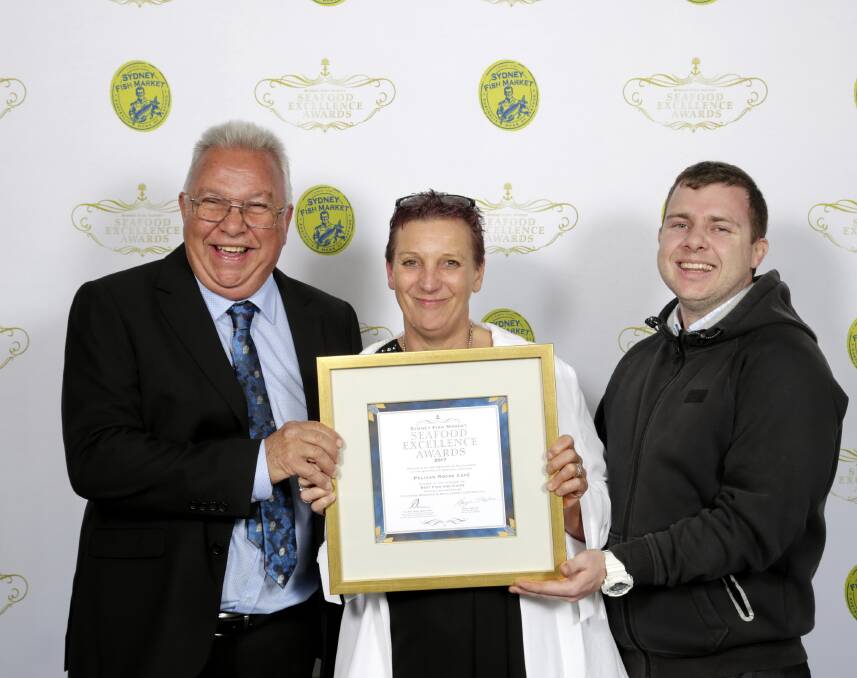 Ron Cardow, Sharon Gould and Brad Shepherd celebrate Pelican Rocks Cafe's success at the Sydney Fish Market Seafood Excellence awards. Photo:EventPix