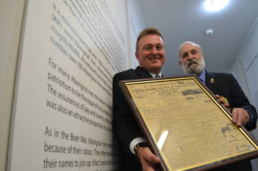NEW HOME: Nowra RSL Sub-Branch secretary Rick Meehan (left) and president Fred Dawson with parts of the In Memory exhibition which will be officially unveiled in its new permanent home next Wednesday.