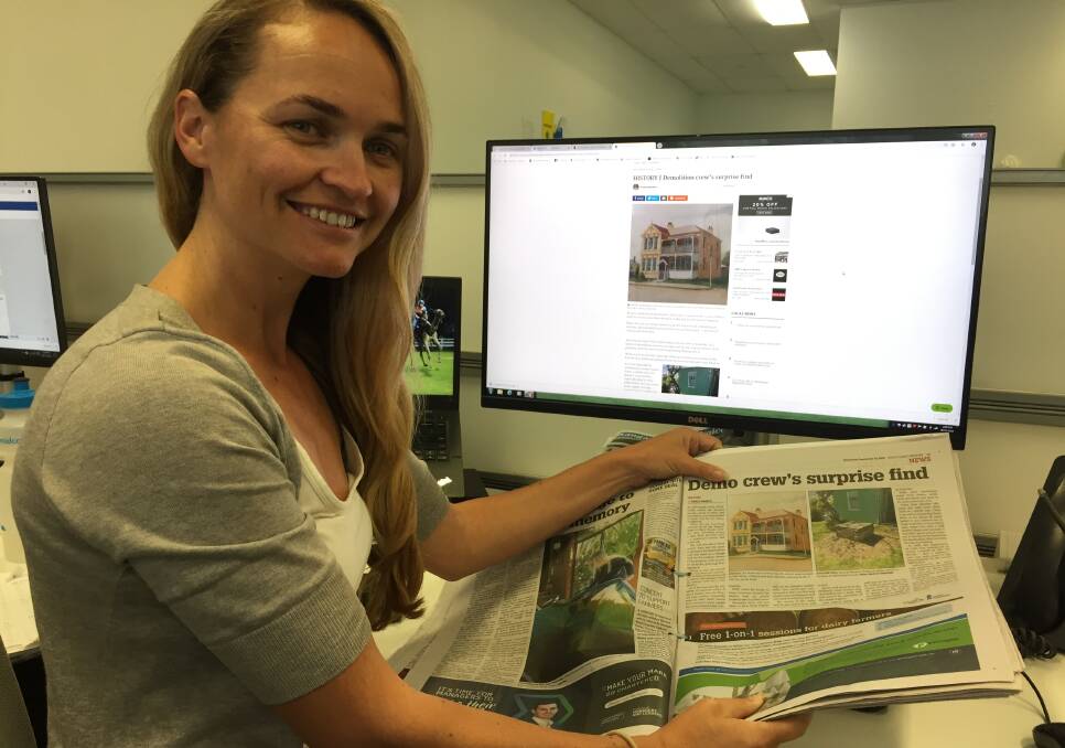 GREAT READ: South Coast Register journalist Hayley Warden with a hardcopy and on-line version of her historical article which led Nowra Public students on a treasure hunt.
