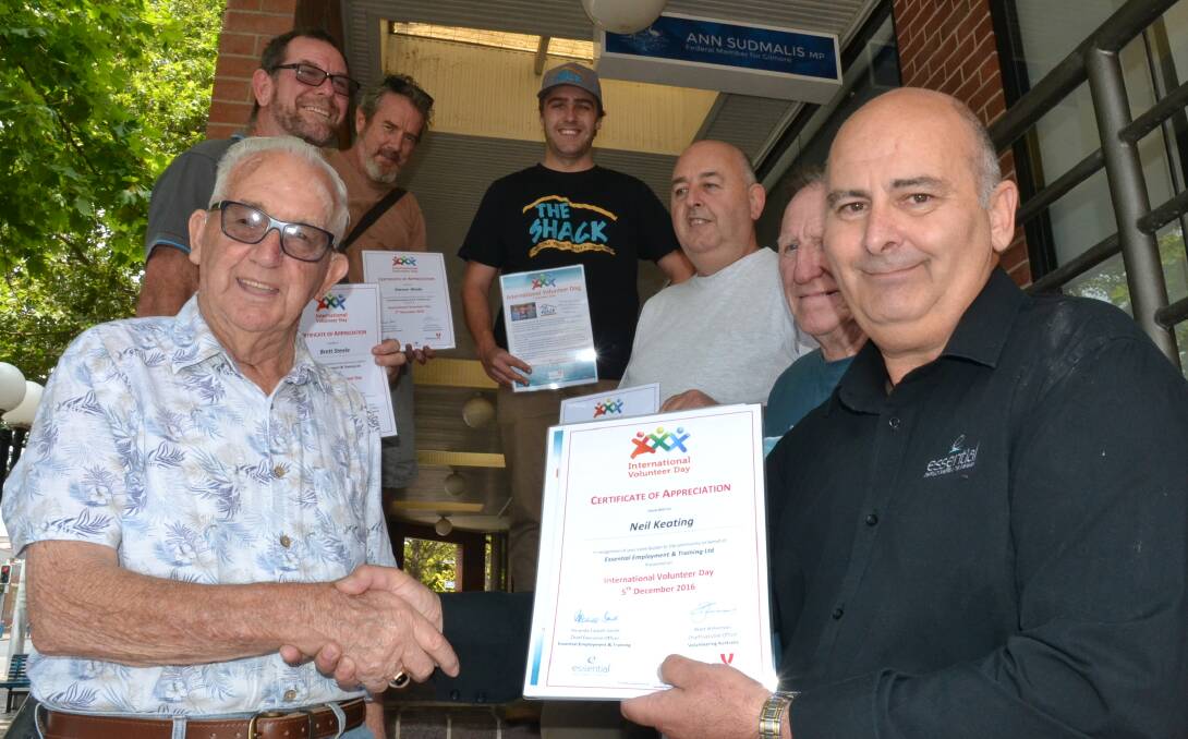The Shack Terara founder Garry Field (right) presents a certificate of appreciation to volunteer Neil Keating with Brett Steele, Steve Wade, Jonathan Vidamour, Michael Bart and Allan Steele.