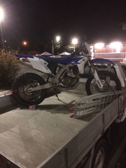 The stolen 2012 Yamaha WR450F on the back of a utility at the Archer Hotel, which was later recovered in Dubbo.