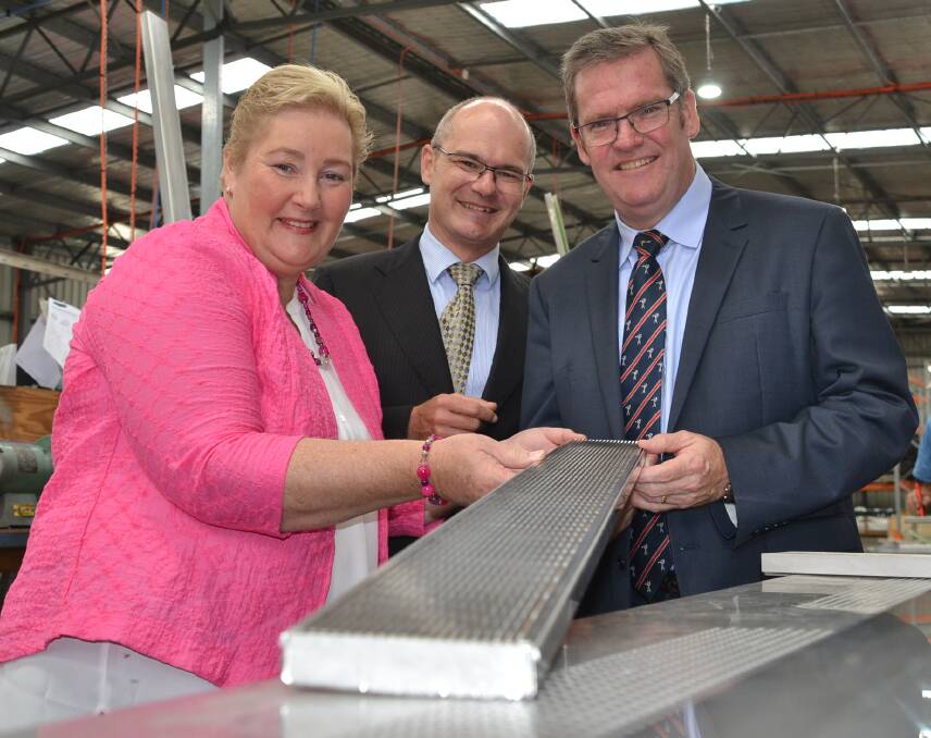 Gilmore MP Ann Sudmalis and Minister for Regional Development, Territories and Local Government John McVeigh tour South Nowra business Stormtech with owner Troy Creighton.
