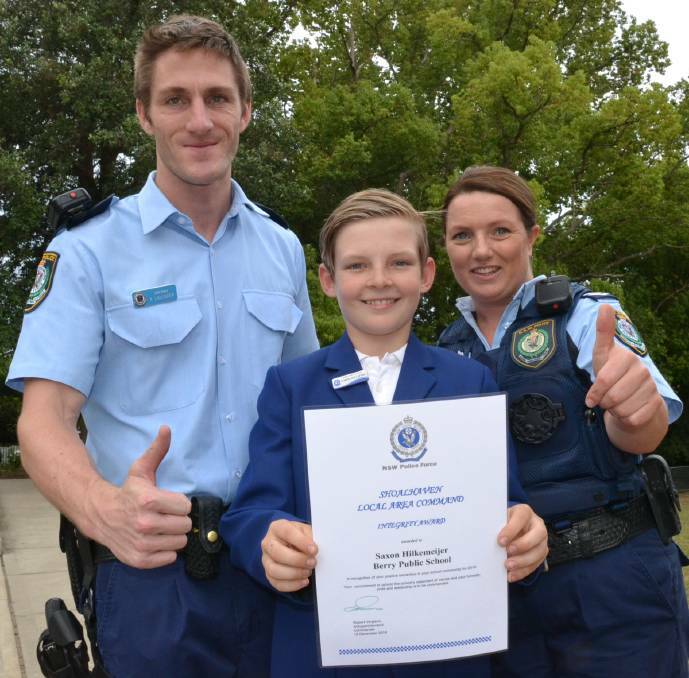 WINNER: 2016 winner of the Shoalhaven Local Area Command Integrity Award was Berry Public School captain Saxon Hilkemeijer. He was presented with the award by Berry police officer Senior Constable Kyle Lavender and Shoalhaven LAC acting Youth Liaison Officer Senior Constable Rachael Pearce.