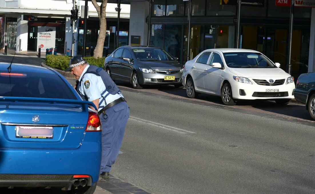 NSW Police Shoalhaven crime prevention officer Senior Constable Anthony Jory on the beat.

