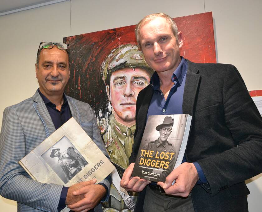 Artist George Petrou and journalist Ross Coulthart at the Fleet Air Arm Museum at HMAS Albatross during the Lost Diggers of Vignacourt Exhibition.