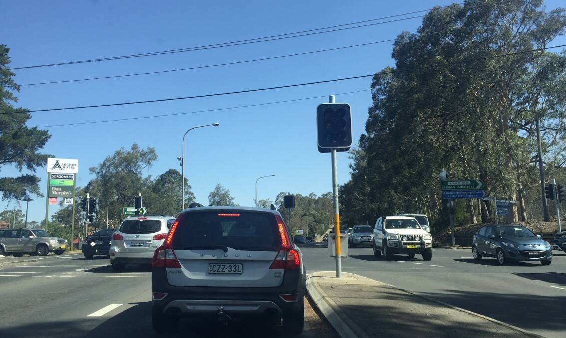 Take care: The traffic lights at the intersection of the Princes Highway and Kalandar Street in Nowra are blacked out.