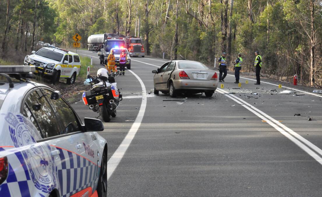 ENOUGH: Emergency services personnel have called for upgrades to the Princes Highway to try and curb the scene they were confronted with at Jerrawangala last Friday where two people were killed.
