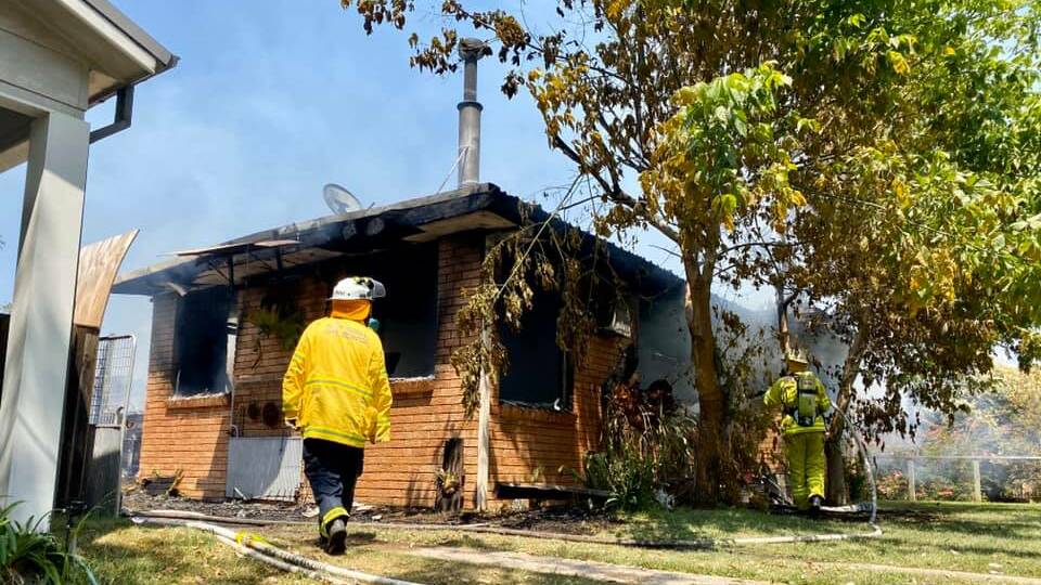 A number of fire crews, both RFS and Fire and Rescue NSW, fought the house fire at Shoalhaven Heads. Photo: Shoalhaven Heads RFS