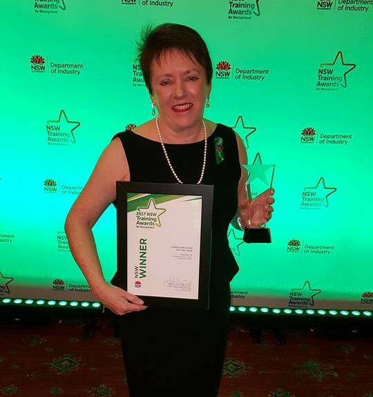 HONUR: Shoalhaven Water director Carmel Krogh with the NSW Training Large Employer of the Year award.