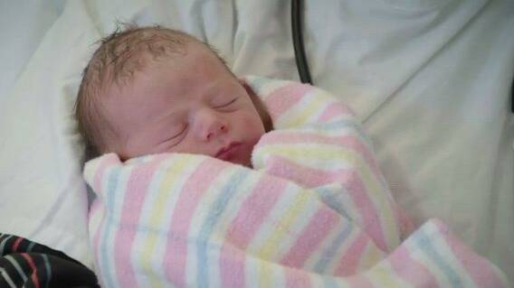 Little Lani Chase not long after making his arrival into the world appears on The Block. Photo: Channel Nine/The Block
