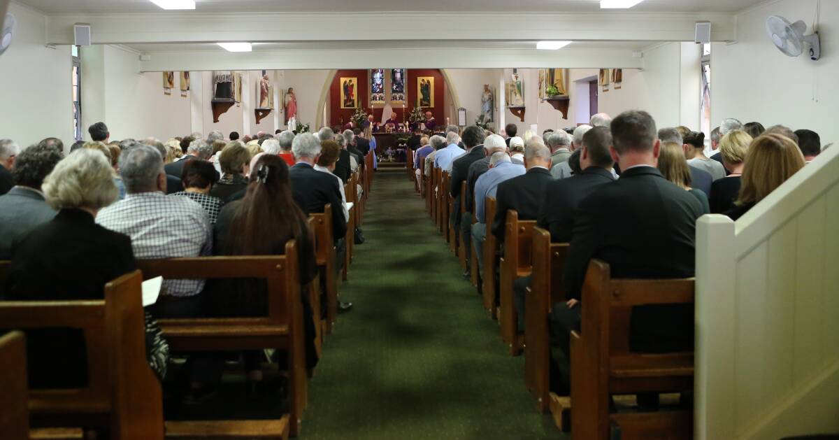 A packed St Michael's Church in Nowra farewells Dr Bill Ryan.