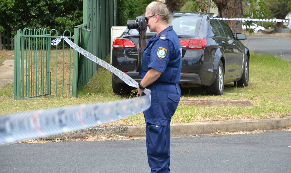 EVIDENCE: Crime scene officers have photographed and gathered evidence from around the area for most of the afternoon.
