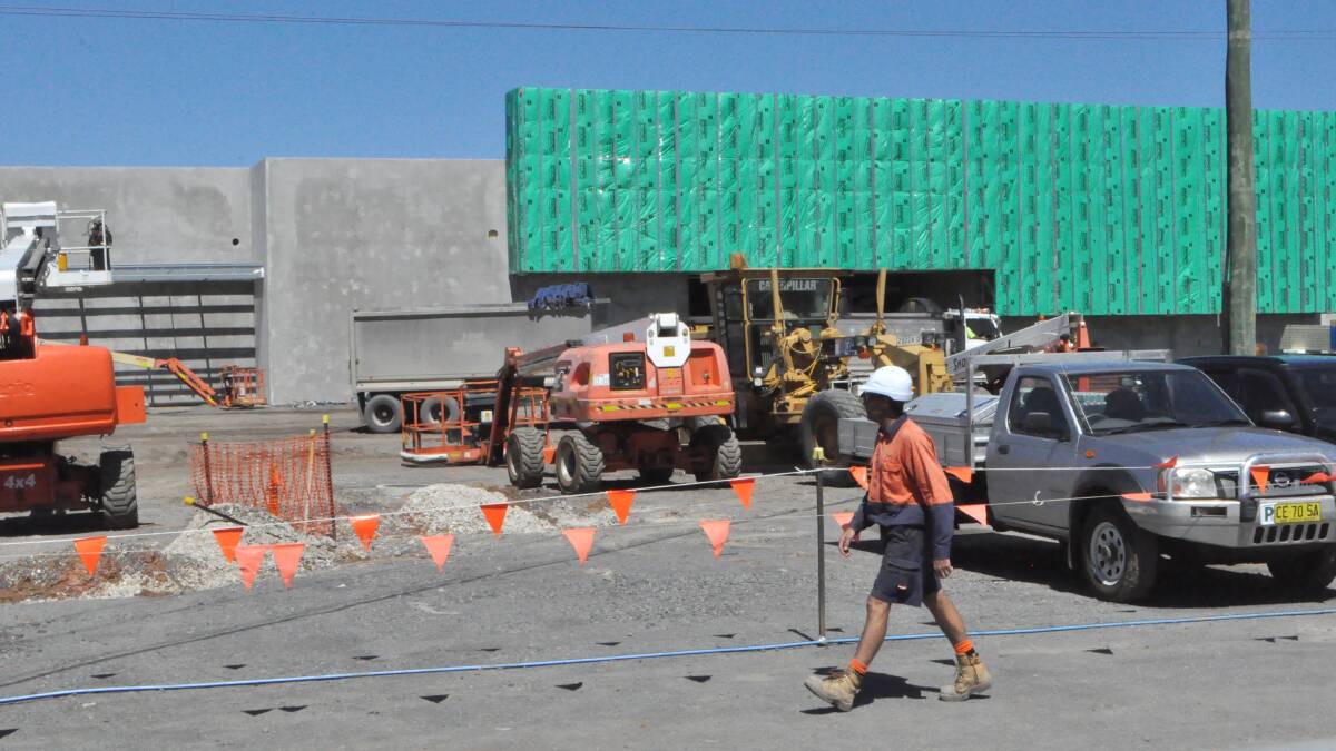 WORK SITE: Workers are still busy at the Masters development at South Nowra, despite Woolworths' confirmation the store would not open.
