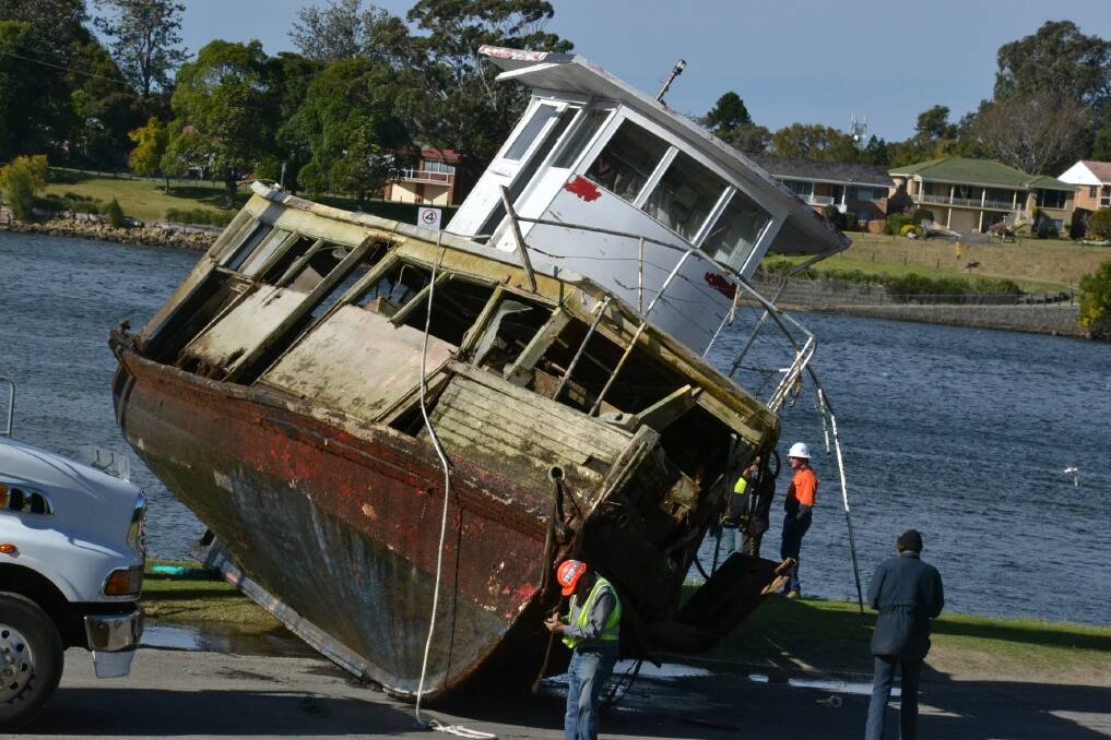 The Christine J on dry land on the bank of the Shoalhaven River.