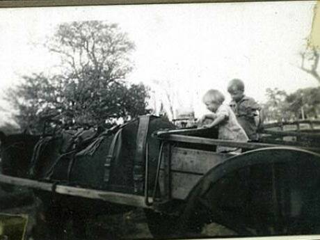 Pat and Bob Smith in the back of a cart on Pig Island in 1946. 