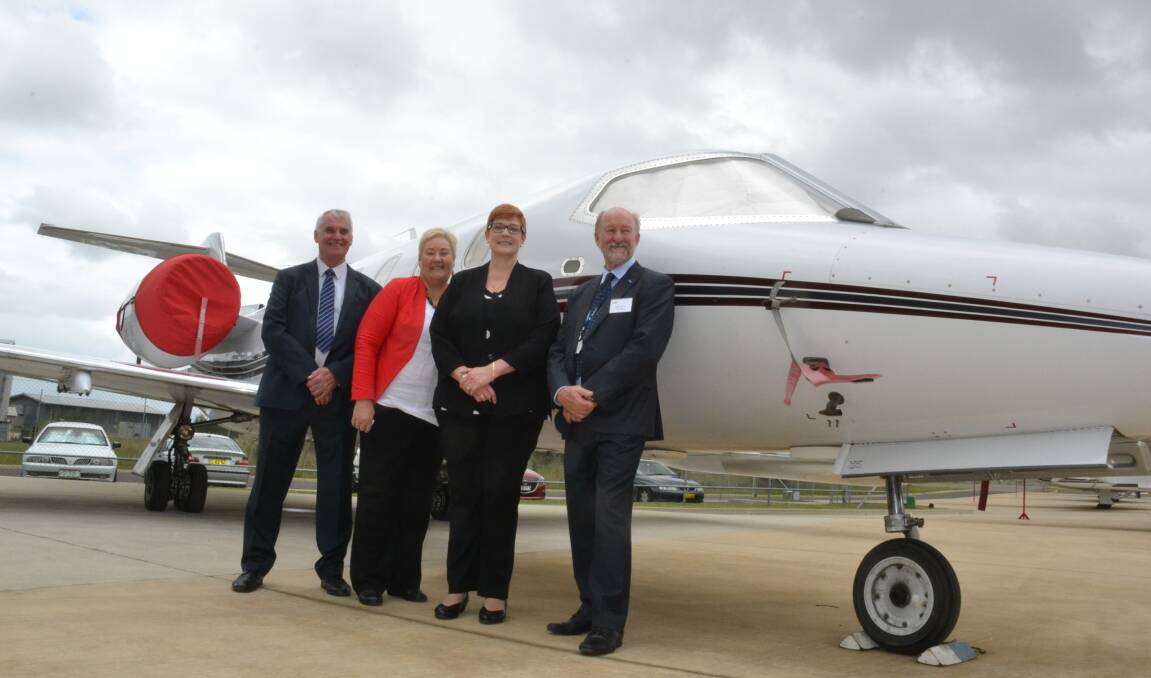 Minister for Defence Senator Marise Payne and Gilmore MP Ann Sudmalis with Air Affairs CEO Chris Sievers and one of the company's LearJets.