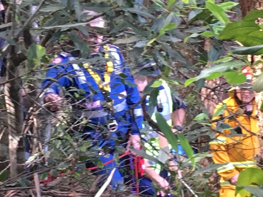 NSW Ambulance paramedics used safety ropes to reach the injured man.