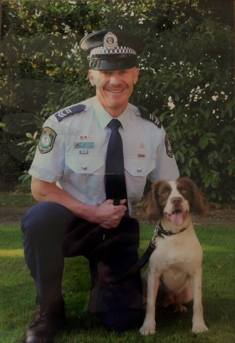 Retired NSW police officer Matthew Warwick with his then partner, bomb detection dog, Toby the Springer Spaniel.