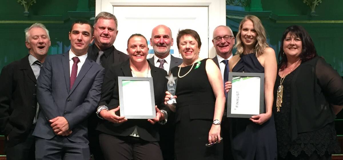 RECOGNITION: The Shoalhaven Water team, with director Carmel Krogh (centre) celebrate their NSW Training Large Employer of the Year award win.