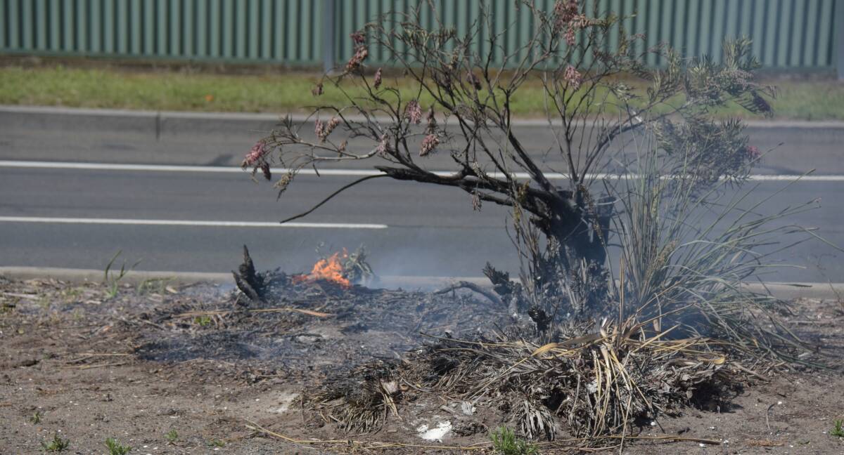 The fire on the median strip on the Princes Highway at Bomaderry on Thursday afternoon.