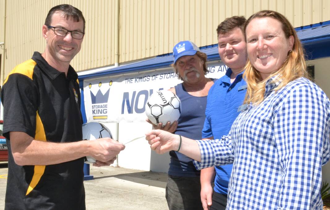 SUPPORT: Bomaderry Football Club vice-president Clayton Muller accepts the donation from Storage King South Nowra owner Brett Beverley, assistant manager Jeffrey Lamont and manager Robyn Jaques.