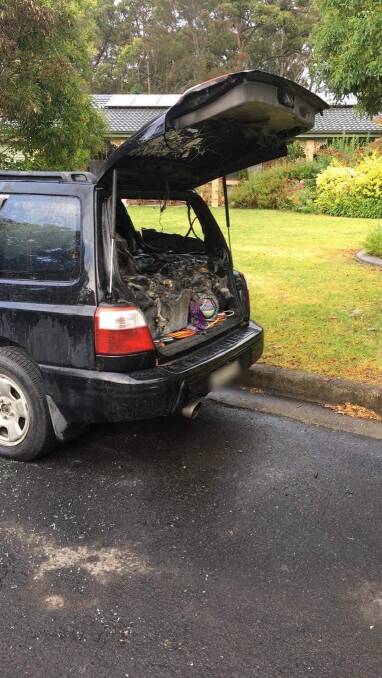 The black Subaru was extensively damaged in a suspicious fire in Romar Close, Bomaderry in the early hours of Sunday.