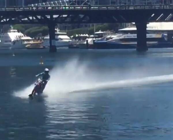 Robbie Maddison on the water of Cockle Bay on Darling Harbour as part of the Sydney Motorcycle Show last weekend. Image Glenn Tyson.
