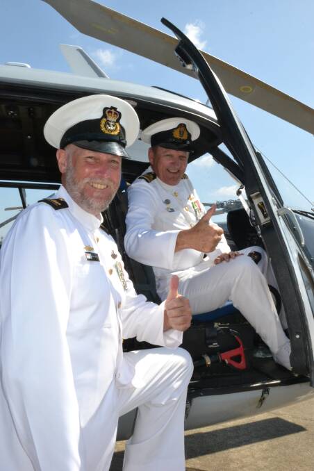 GREAT MACHINE: Warrant Officer Stu Walters and Lieutenant Commander Tony Reyne who have both had a long association with the Squirrel helicopter farewell the little workhorse last week.